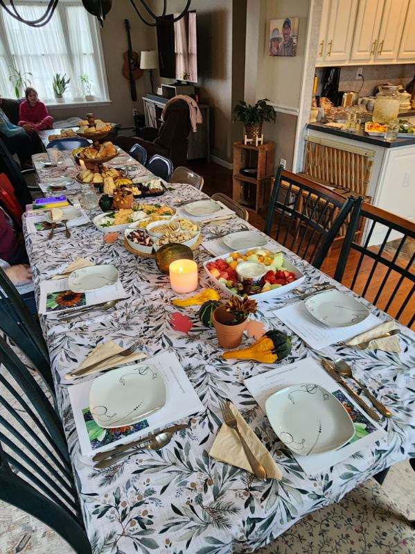 A prepared fellowship table welcoming guests