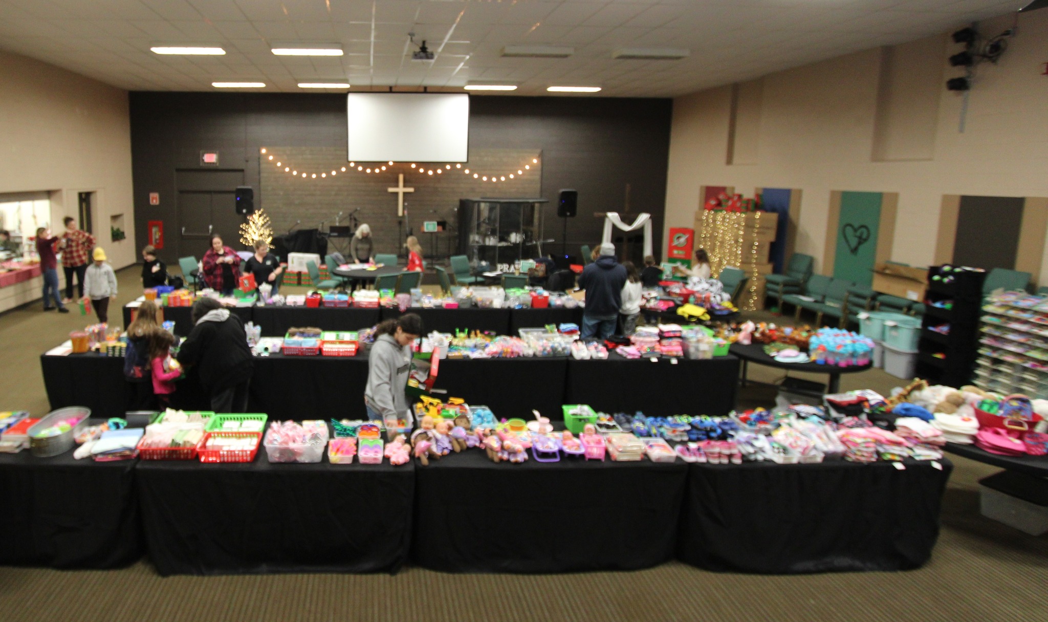Community hall prepared with practical care supplies for a Life of Faith Gospel Ministries outreach event in Brampton