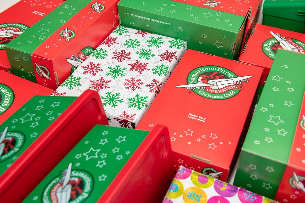 Close view of prepared gift boxes for seasonal outreach